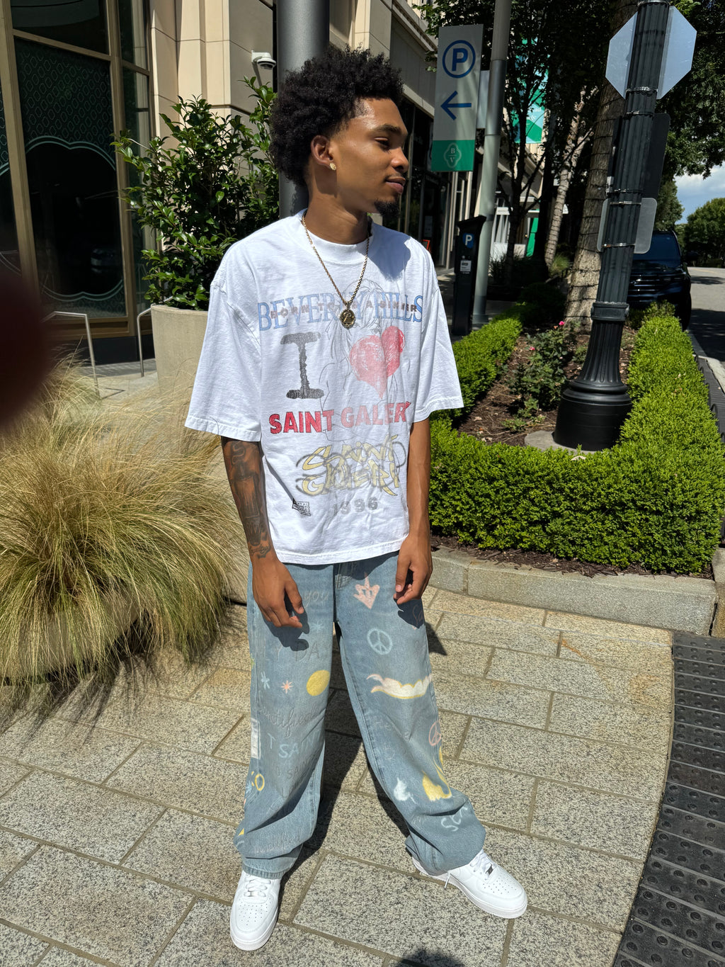 SAINT GALLERY ALL OVER PRINT JEANS